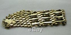 9 Carat Gold Broad Seven Bar Gate Bracelet With Heart Padlock