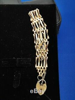 9ct gold 5 Bar Gate Bracelet with heart shaped lock and safety chain 10.7g
