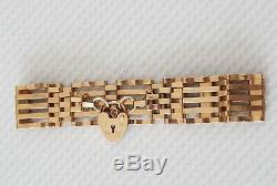 9ct gold 5bar gate bracelet with heart shaped lock and safety chain EX CON 10.8g