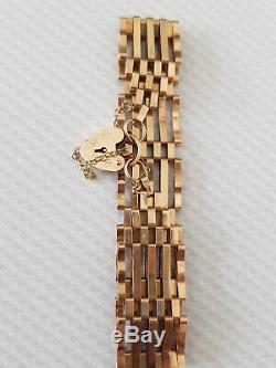 9ct gold 5bar gate bracelet with heart shaped lock and safety chain EX CON 10.8g