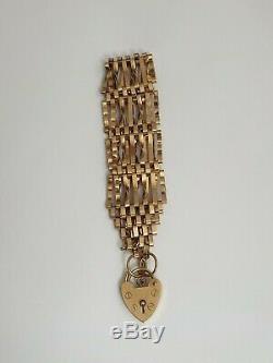 ASJ 375 9ct Gold 6 Bar Gate Bracelet With Heart Padlock Fastening 13.4g