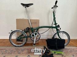 Brompton M2L folding bike with Brompton luggage, box and manual. Collection Only